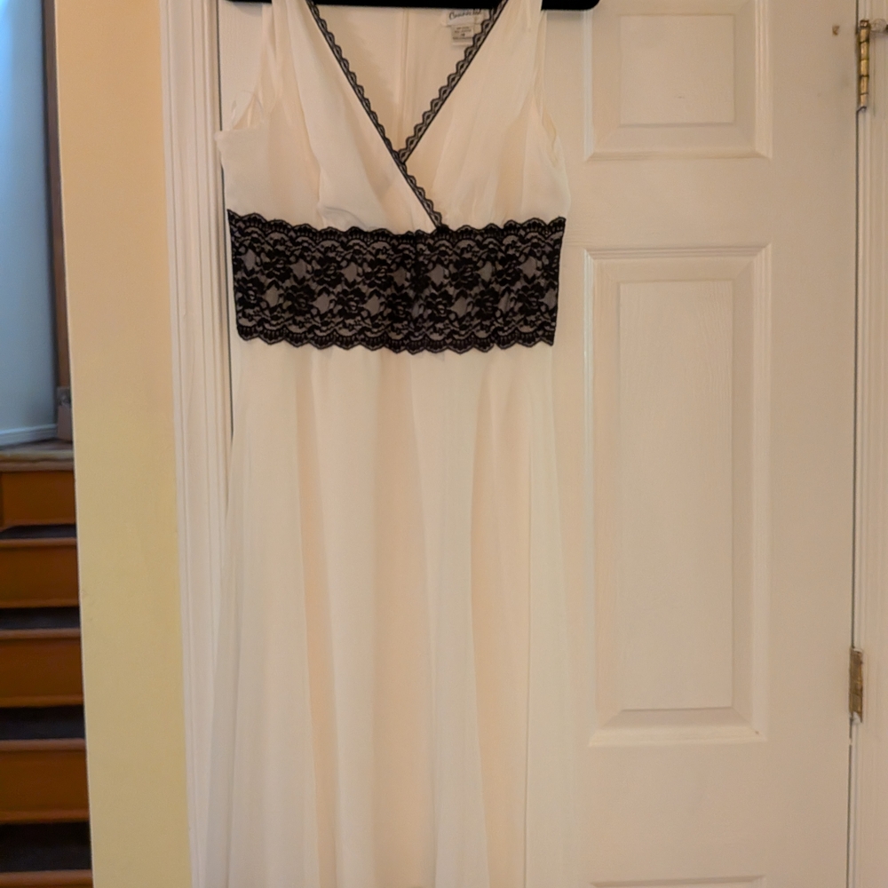Chic White Dress with Black Lace Overlay